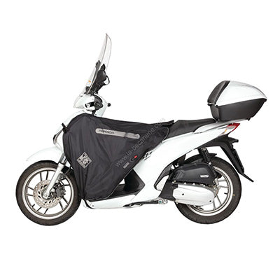 TABLIER COUVRE JAMBE TUCANO POUR KYMCO 125 PEOPLE S 2018+ (R200-X) (TERMOSCUD) (SYSTEME ANTI-FLOTTEMENT SGAS)