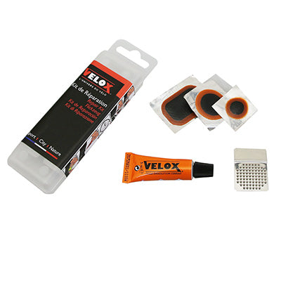 KIT REPARATION CHAMBRE A AIR VELOX CITY-VTC - BOITE (1 PATCH 15mm + 1 PATCH 25mm + 1 PATCH 24x34mm + COLLE 5g + RAPE ACIER) AVEC NOTICE