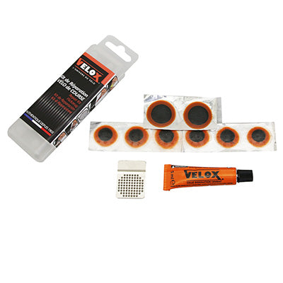 KIT REPARATION CHAMBRE A AIR VELOX ROUTE  - BOITE (6 PATCHS 15mm + 2 PATCHS 25mm + COLLE 5g + RAPE ACIER) AVEC NOTICE